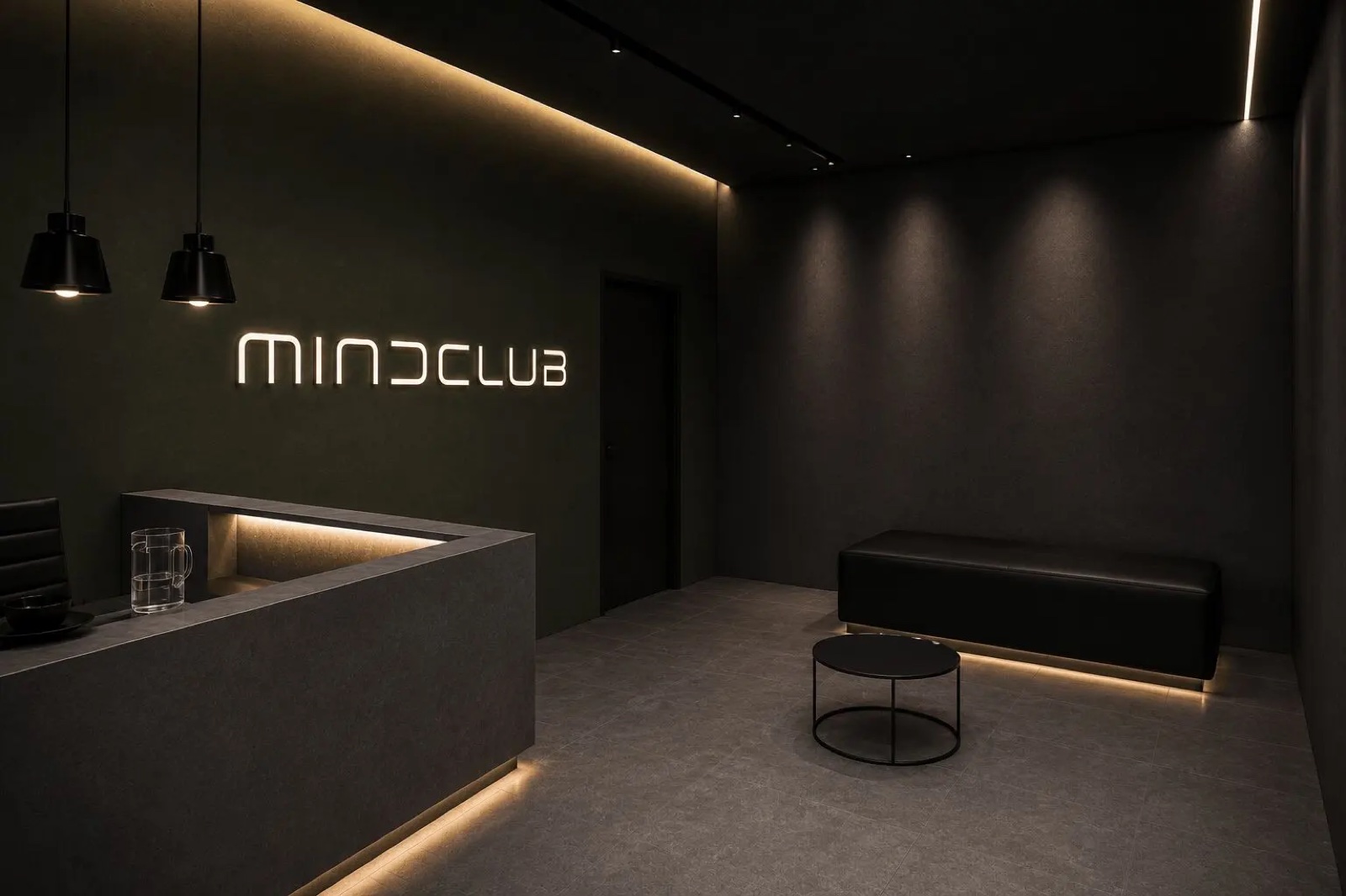 A Mindclub sötét, letisztult recepciója világító felirattal